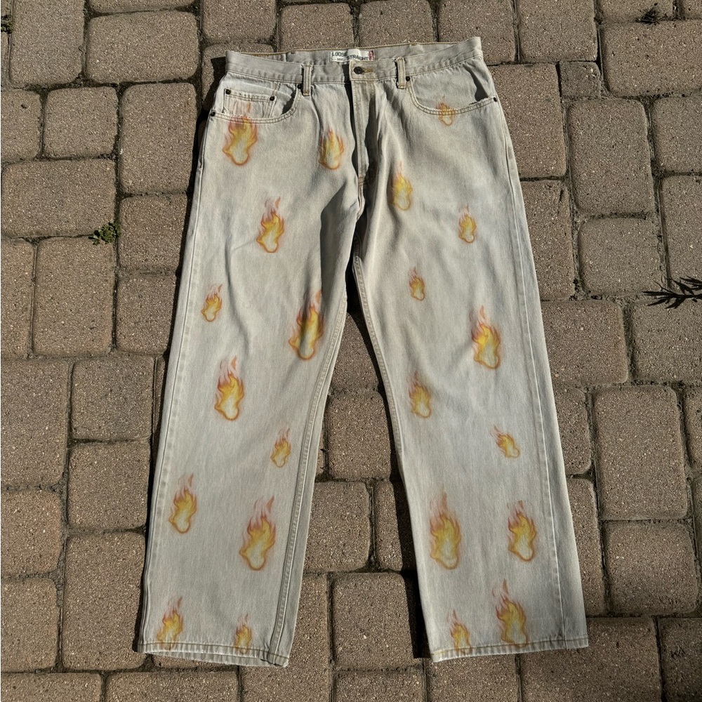 Vintage cream denim Levi’s jeans with pressed flames